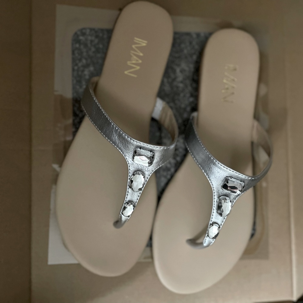 Iman silver, jeweled, flip flop sandals.
